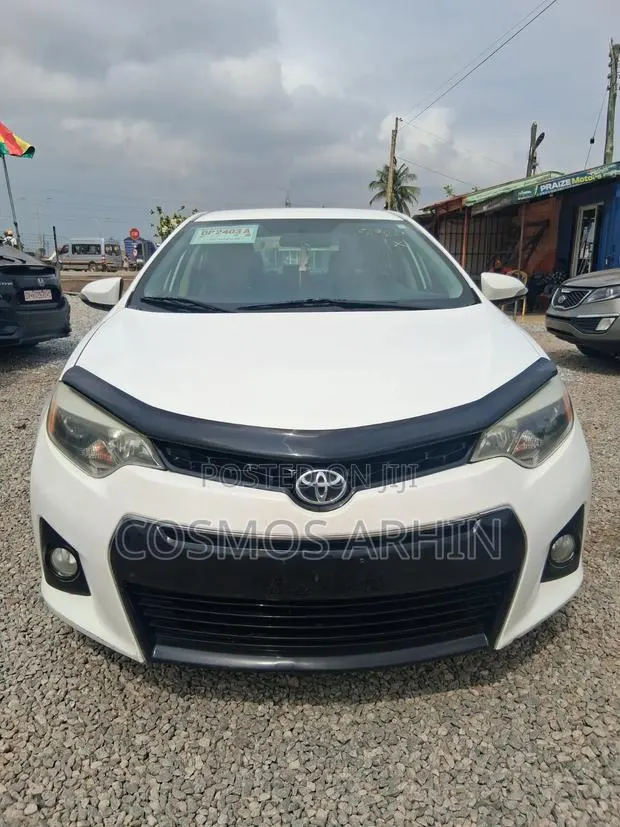 Toyota Corolla 2015 White · Photo 1