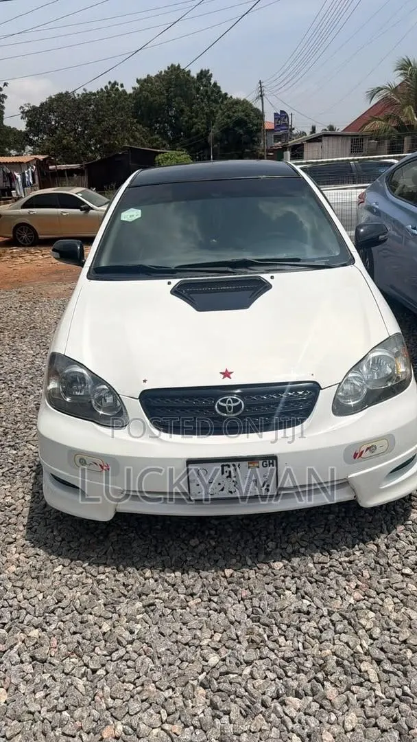 Toyota Corolla 2009 White · Photo 1