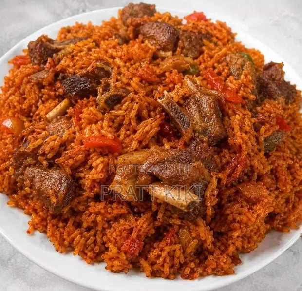 Jollof Rice With Goat Meat -Juicy and Delicious · Photo 1
