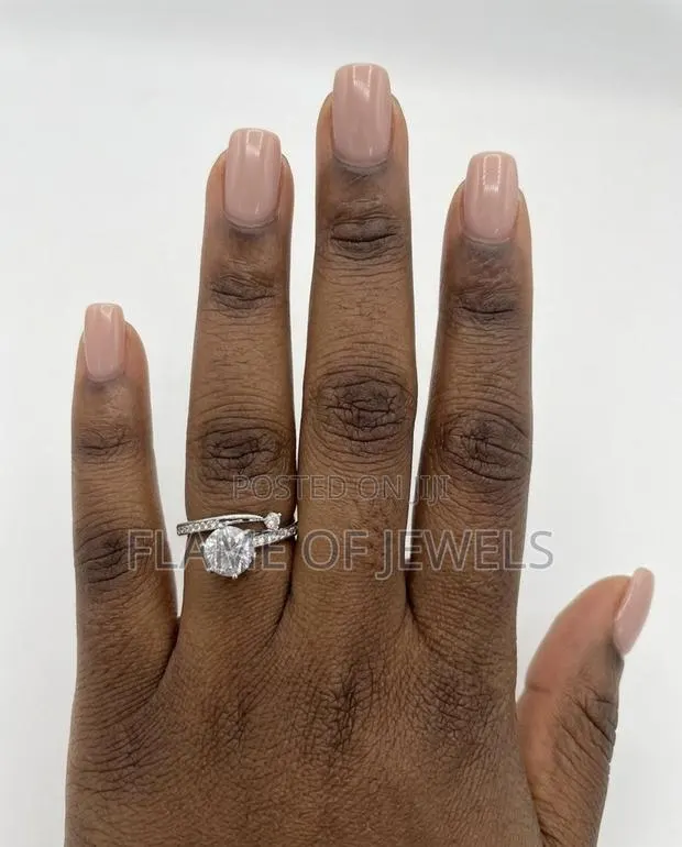 Overlap Elegant Promise and Engagement Ring · Photo 1
