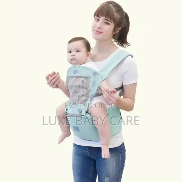 Carrier With Hip Seat Newborn to Toddler Carrier. · Photo 1