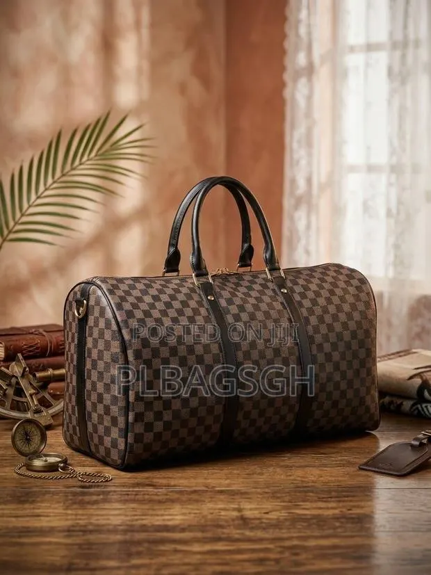 Lv Leather Duffel Traveling Bag Hand Bag Potable to Handle · Photo 1