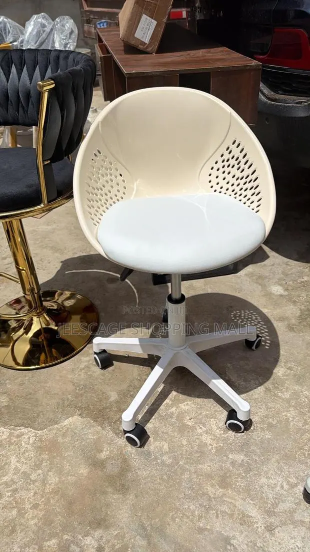 Modern Swivel Desk Chair With Perforated Back and Padded Seat · Photo 1
