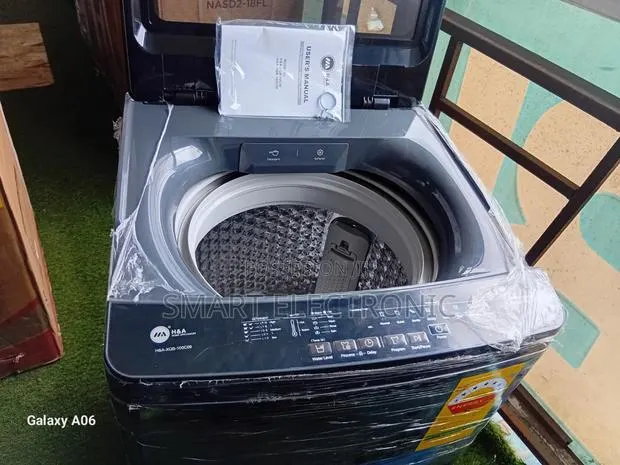 Heavy-Duty Top Load Washer for Fast Efficient Cleaning · Photo 1