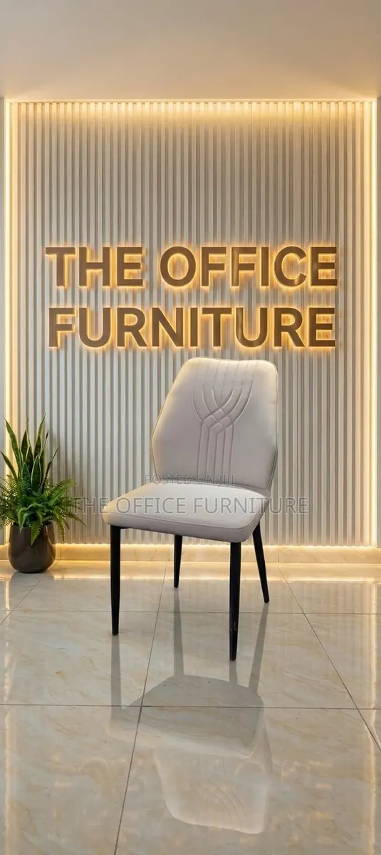 Light Grey Upholstered Dining Chair · Photo 1