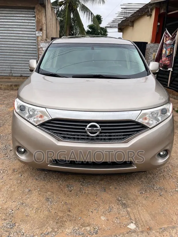 Nissan Quest SL 2011 Beige · Photo 1