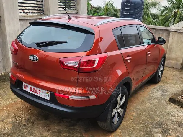 Kia Sportage 2014 Orange · Photo 1