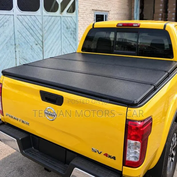 New Hard Tri-Fold Pickup Truck Bed Cover for Nissan Navara / Frontier · Photo 1