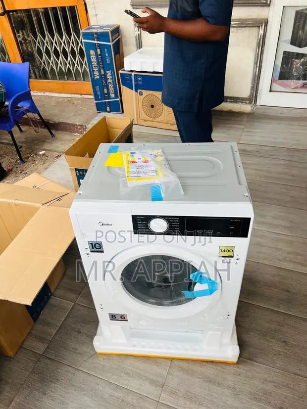 Extremely Affordable Midea Front Load Washing Machine(White). · Photo 1