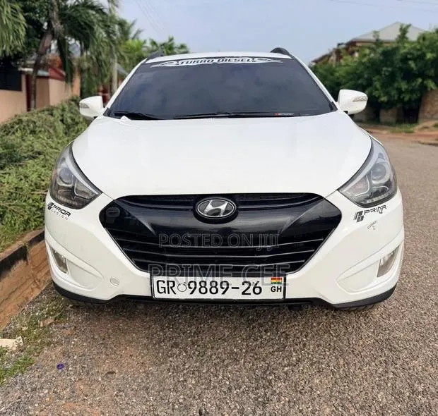 Hyundai Tucson 2013 White · Photo 1