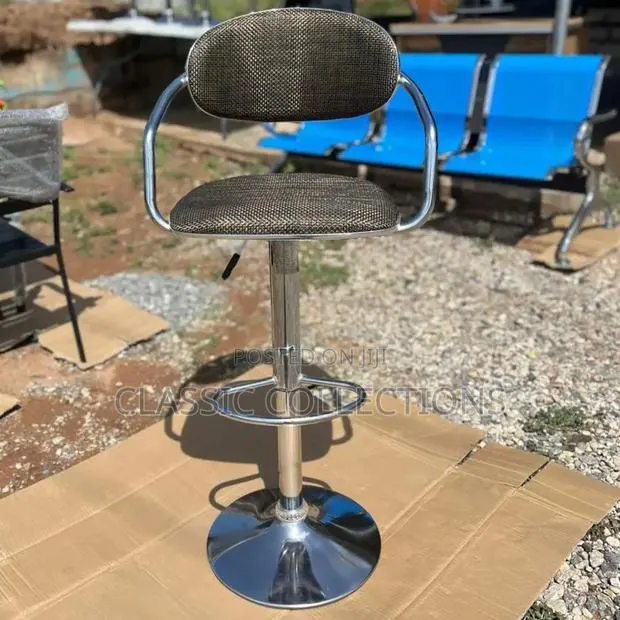 Bar Stool With Curved Chrome Frame · Photo 1