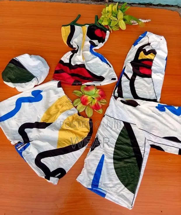 4 in 1 Nightwear
(
Bonnet ,Singlet,Shorts 
Trousers ) · Photo 1