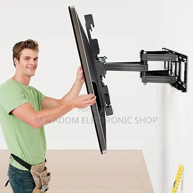 We Have Instock All Kinds of Adjustable Tv Mount 32”-75” · Photo 1