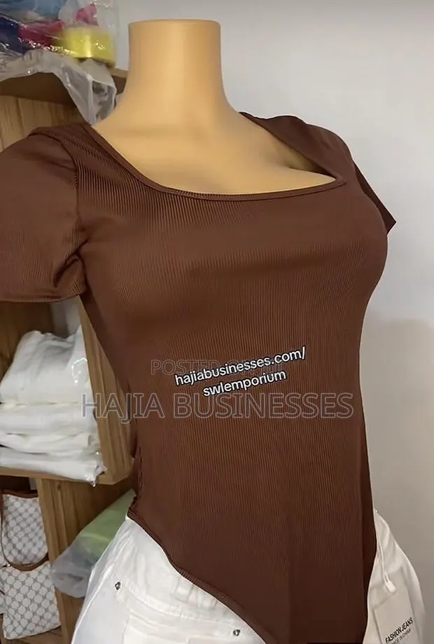 Short Sleeved Bodysuit Tops · Photo 1