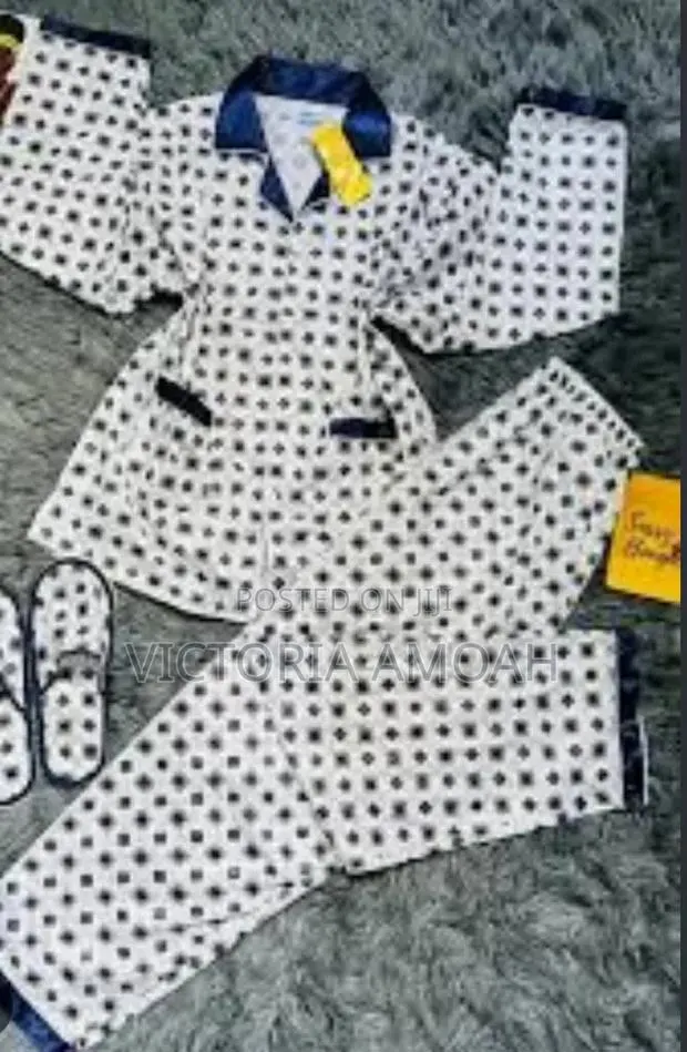A Pyjamas Top Down With Attached Bedroom Slippers Set. · Photo 1