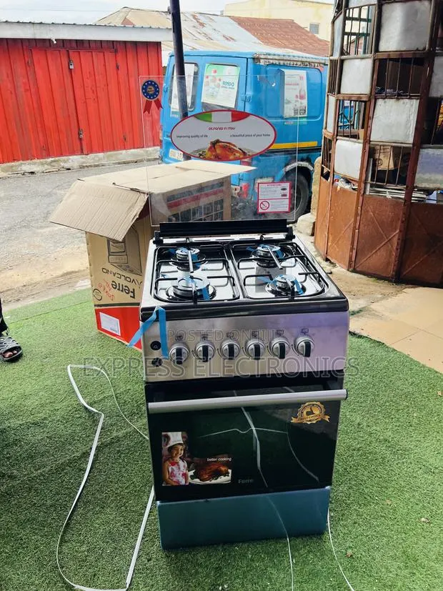 Get a New Gas Cooker Oven 4burner 50/60 Oven Rotisserie · Photo 1