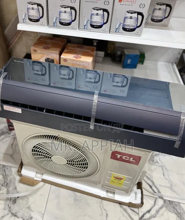 High Efficient TCL 1.5hp Inverter Ac(Black) Mirror · Photo 1