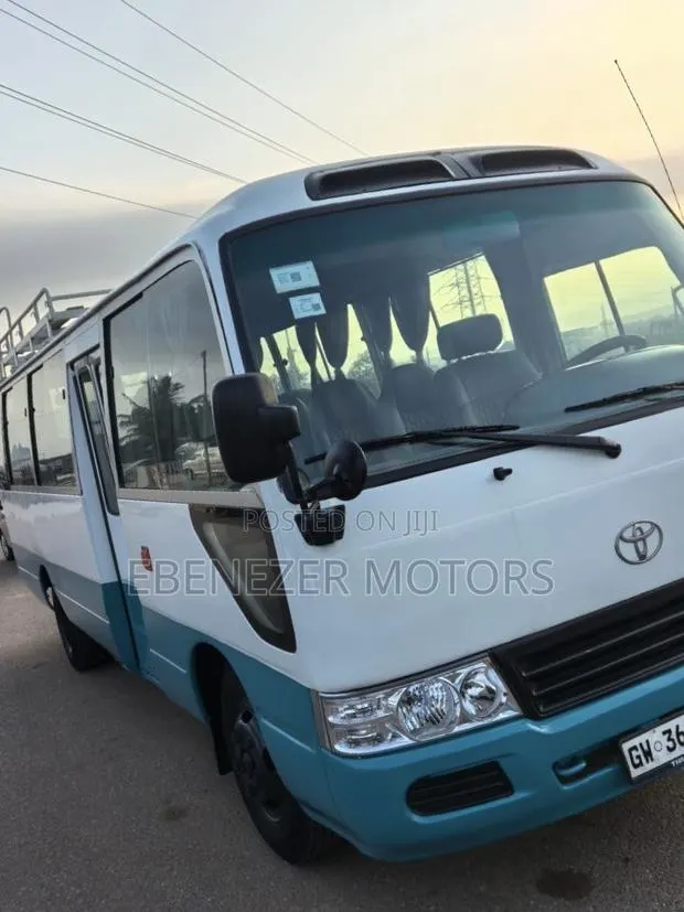 Toyota Coaster 2008 White · Photo 1