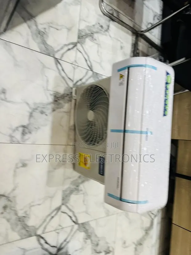 Less Expensive Air Conditioner Nasco Dual Inverter Nasco 1.5hp · Photo 1
