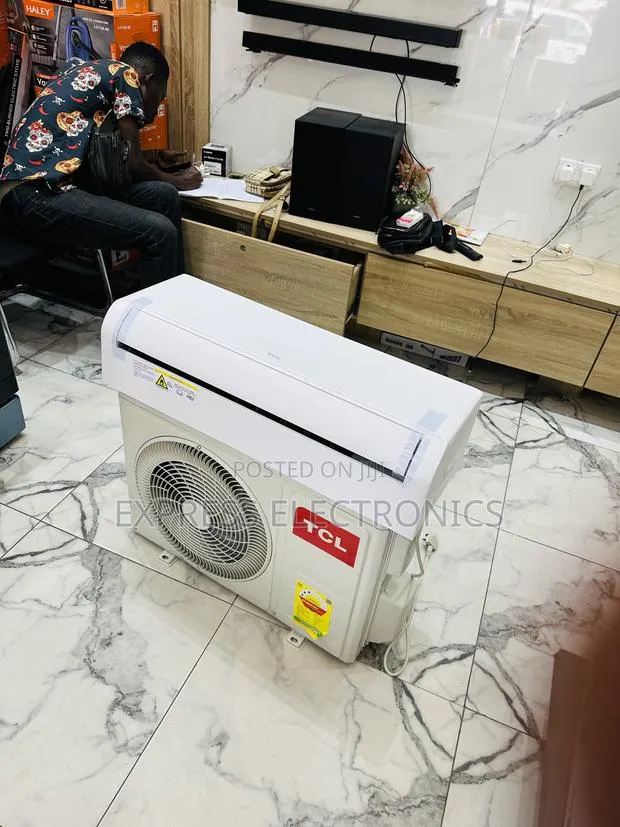 Eco Mode TCL 1.5hp Split R410 Gas White · Photo 1