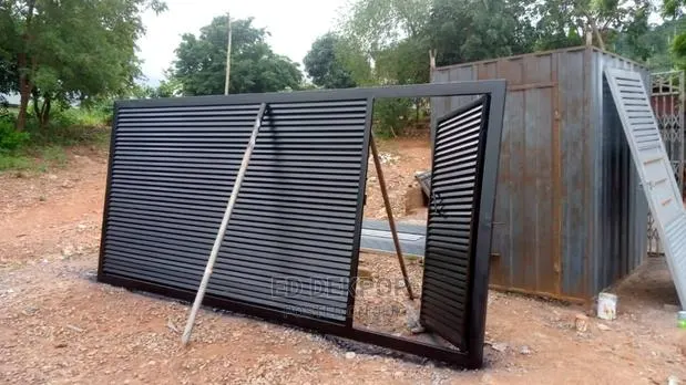 Black and Gold Sliding Gate · Photo 1