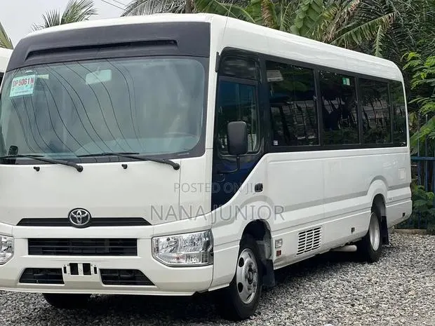 Toyota Coaster 2022 White · Photo 1