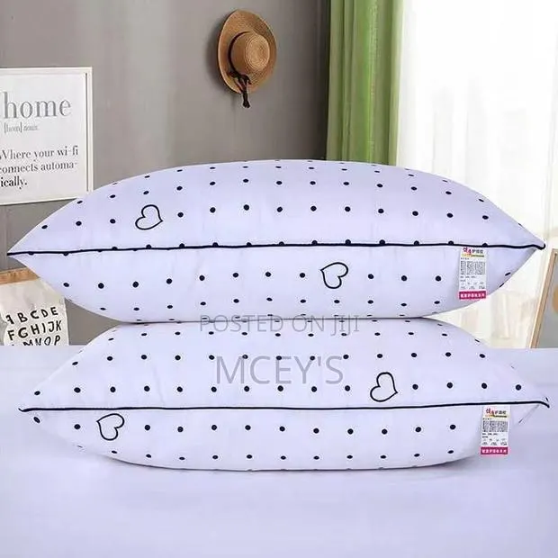 White Cotton Pillows · Photo 1