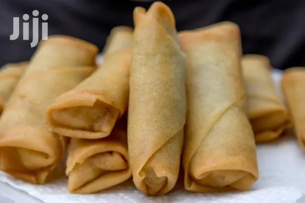 Cakes, Samosa, Spring Rolls,Yam Balls, Fried Chicken And Mor · Photo 1