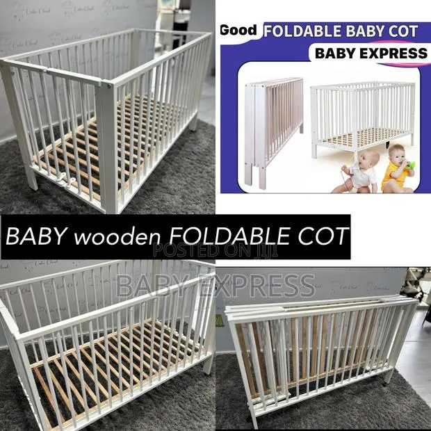 Foldable Wooden Baby Cot – Portable, Durable Space-Saving Infant Bed · Photo 1