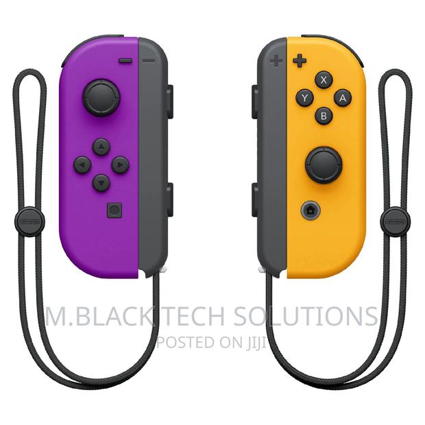 Nintendo Neon Purple/ Neon Orange Joy-Con (L-R) - Switch · Photo 2
