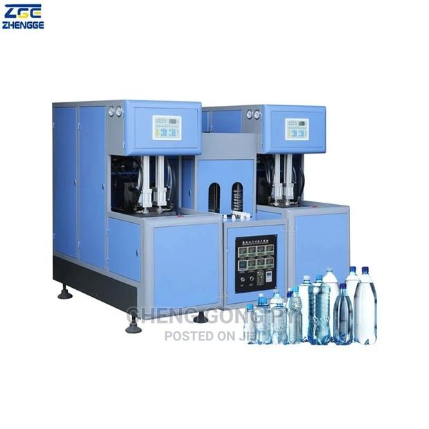 Complete Semi Automatic Dual Cavity Bottle Blower Machine · Photo 1