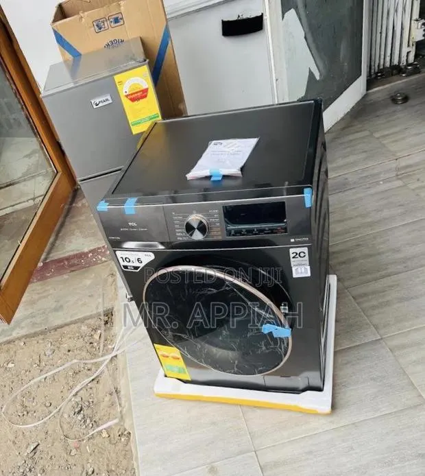 Sleek Sliver Design TCL 10.5kg Front Load Washing Machine(Silver). · Photo 1