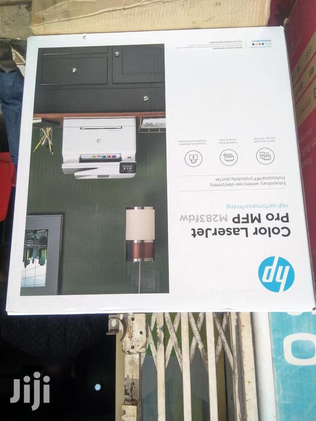 At HP Colour Pro M283fdw Multi-Function Printer ( · Photo 1