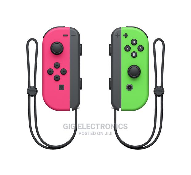 Nintendo Switch Joy-Con Pair, Neon Pink and Neon Green · Photo 2