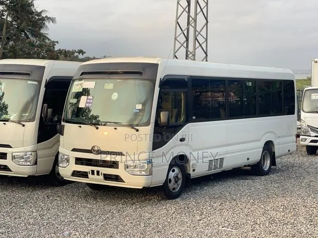 Toyota Coaster 2022 White · Photo 1