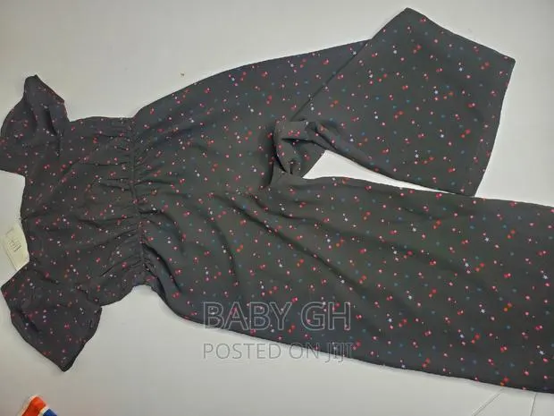 Girls Black Star Themed Jumpsuit · Photo 1