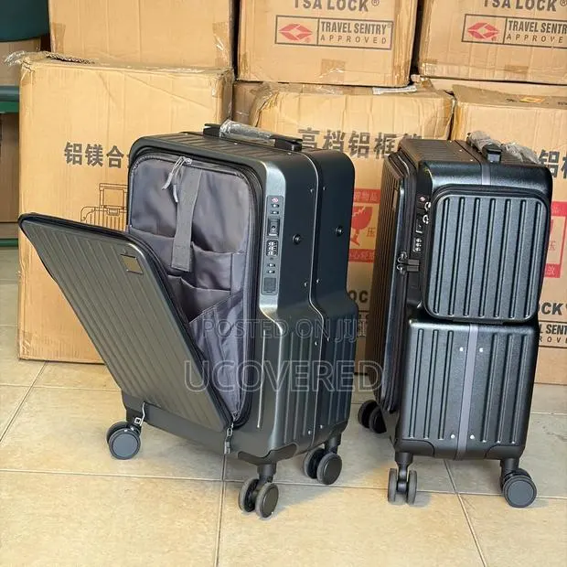 Aluminum Suitcase Features a Distinctive Front-Opening Panel · Photo 1