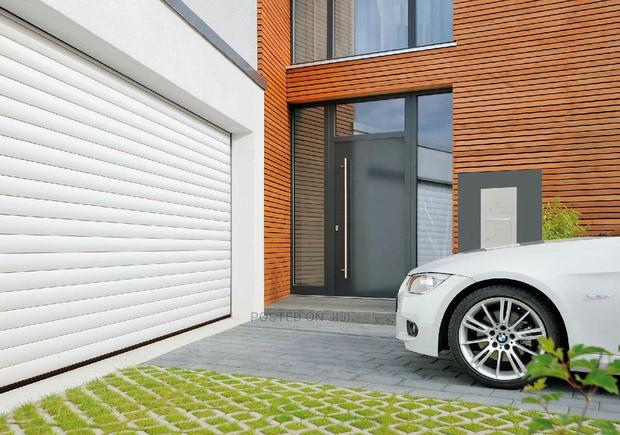 American Automatic Garage Door Now Available at Bluecity · Photo 4