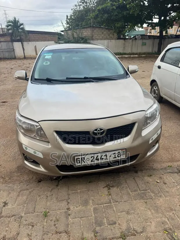 Toyota Corolla 2010 Gold · Photo 1