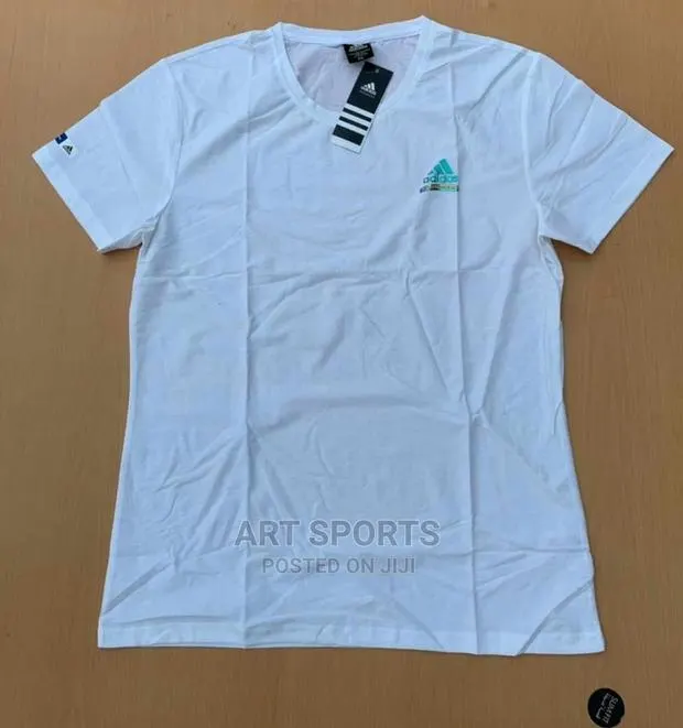 Adidas Tops. · Photo 1