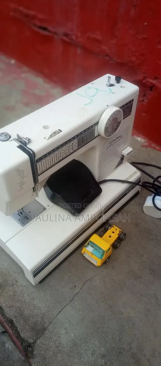 Electric Sewing Machine · Photo 1