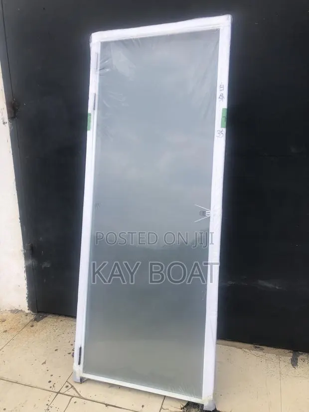 A Frosted Glass Door With Thick Glass · Photo 1