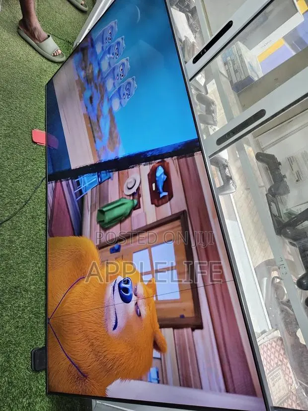 75inch Samsung Smart UHD TV With Small Line on the Screen · Photo 1