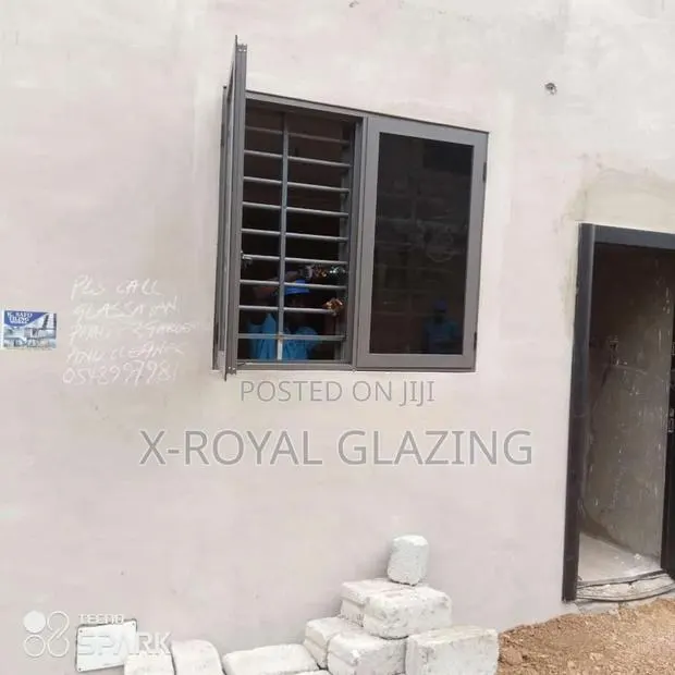 Grey Coating Italian Projected Windows Well Installed · Photo 1