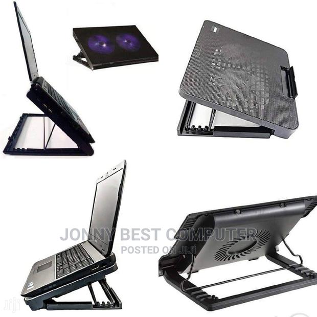 Laptop Cooling Pad and Adjustable Stand · Photo 1