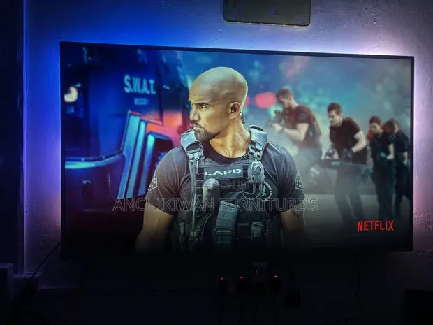 Android 65 Inches Philips Tv With 3 Sided Ambient Lighting Effects · Photo 1