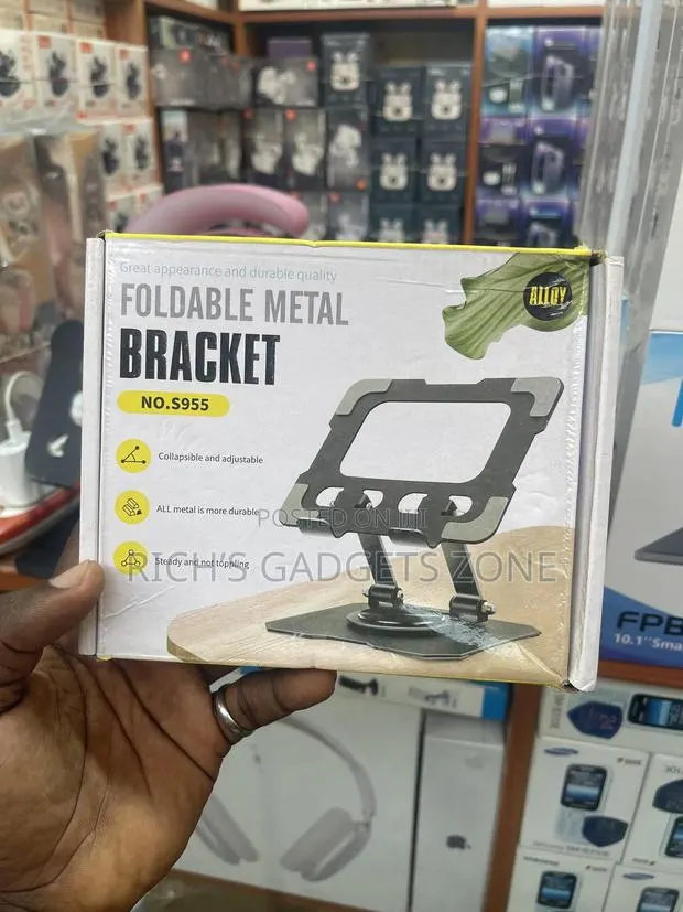 Foldable Metal Desktop Stand: 360° Freedom! · Photo 1