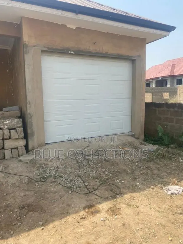 Ccanadian Garage Door · Photo 1