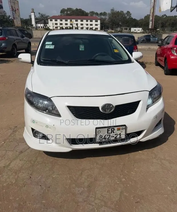 Toyota Corolla 2009 White · Photo 1
