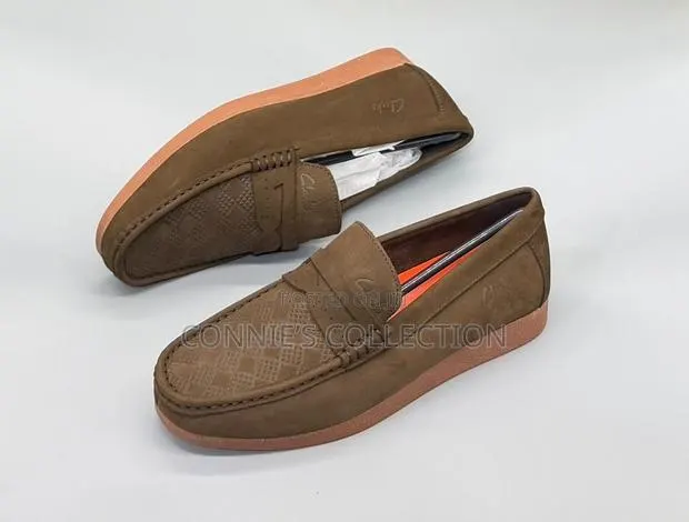 Clarks-Branded Penny Loafers · Photo 1